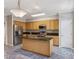 Inviting kitchen featuring stainless steel appliances, a center island, and ample storage at 2515 Oak Quarters, Smyrna, GA 30080