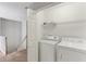 Convenient upstairs laundry room with modern appliances and easy access at 2515 Oak Quarters, Smyrna, GA 30080