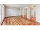 Spacious living room with hardwood floors and bright window shutters at 2515 Oak Quarters, Smyrna, GA 30080