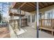 Home exterior featuring a patio with a deck above, accessible by stairs, enhancing outdoor enjoyment at 2515 Oak Quarters, Smyrna, GA 30080