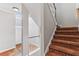 Carpeted stairs lead to the upper level, complemented by wooden handrails and white balusters at 2515 Oak Quarters, Smyrna, GA 30080