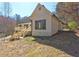 Home exterior showing a wooden deck and stairs to backyard at 1027 Holland Rd, Dallas, GA 30157
