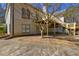 Home exterior showing a covered patio area and upper-level deck at 1027 Holland Rd, Dallas, GA 30157