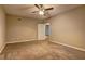 Neutral bedroom with carpet, ceiling fan, and access door at 1027 Holland Rd, Dallas, GA 30157