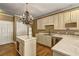 Charming kitchen featuring granite countertops, stainless appliances and white cabinetry at 1027 Holland Rd, Dallas, GA 30157
