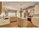 Spacious kitchen features an island, stainless appliances and granite countertops at 1027 Holland Rd, Dallas, GA 30157