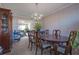 Traditional dining room featuring an elegant chandelier, wood table, and decorative furnishings at 3060 Prairie Rose Ln, Ellenwood, GA 30294