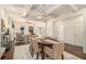 Elegant dining room with modern lighting, hardwood floors, and comfortable seating, perfect for Gathering meals at 65 Vannoy Se St, Atlanta, GA 30317