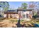 Home's backyard featuring a brick exterior, offering a private outdoor space at 1618 Cheryl Leigh Dr, Riverdale, GA 30296