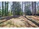 Expansive backyard with mature trees, providing a private and natural oasis at 1618 Cheryl Leigh Dr, Riverdale, GA 30296