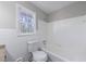 Bright bathroom features updated tile flooring, fixtures, and tub with shower combo at 1618 Cheryl Leigh Dr, Riverdale, GA 30296