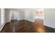 Hardwood floors featuring an open floor plan and light-filled rooms at 1618 Cheryl Leigh Dr, Riverdale, GA 30296