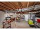 Unfinished basement with exposed ductwork, shelving, and concrete floors at 1995 Tara Nw Ct, Kennesaw, GA 30144