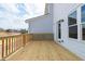 Wide back deck featuring a natural wood-stained deck floor and house entrance at 4826 Floydwood Ln, Mableton, GA 30126