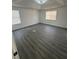 Spacious bedroom with hard surface flooring, and lots of natural light at 5055 Promenade Sw Dr, Atlanta, GA 30331