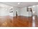 Expansive living room featuring gleaming hardwood floors at 5729 Evadale Trce # 6, Mableton, GA 30126