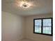 Well-lit bedroom featuring a view from the window at 2087 Blackberry Ln, Auburn, GA 30011