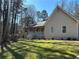 Charming single-story home with a covered front porch and a well-maintained lawn at 2087 Blackberry Ln, Auburn, GA 30011