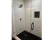 Shower with black fixtures and a tiled interior at 2087 Blackberry Ln, Auburn, GA 30011