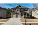 Beautiful two-story home boasts a combination of brick and stone accents, attached two-car garage and a welcoming front porch at 784 Sunset Down Ct, Loganville, GA 30052