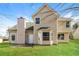 Well-maintained backyard featuring a lovely home exterior with a manicured lawn at 1935 Cutters Mill Way, Lithonia, GA 30058