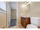 Bathroom featuring a window and a dark wood vanity at 2670 Foxlair Trl, Atlanta, GA 30349