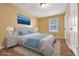 Staged bedroom featuring a queen bed and hardwood flooring at 2670 Foxlair Trl, Atlanta, GA 30349