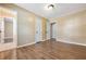 Bedroom featuring two entry doors and hardwood floors at 2670 Foxlair Trl, Atlanta, GA 30349