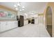 Bright kitchen with white cabinets, granite countertops, and black appliances at 2670 Foxlair Trl, Atlanta, GA 30349