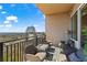Relaxing balcony showcasing city views, stylish seating, and outdoor living space at 2950 Mount Wilkinson Se Pkwy # 712, Atlanta, GA 30339