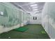 Indoor golf simulator providing a realistic golfing experience for residents at 2950 Mount Wilkinson Se Pkwy # 712, Atlanta, GA 30339