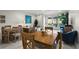 Bright community room with modern decor, wooden tables, comfortable seating, and a view of the outdoors at 2950 Mount Wilkinson Se Pkwy # 712, Atlanta, GA 30339