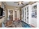 Inviting office with hardwood floors, a custom bookcase, and comfortable seating at 2950 Mount Wilkinson Se Pkwy # 712, Atlanta, GA 30339