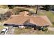 Aerial view of the home, showcasing a well-maintained roof, two car garage, and landscaped front yard at 3401 Doyle Sw Ln, Marietta, GA 30060