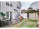 Cozy backyard area with a patio, seating, and a unique outdoor fireplace feature at 6730 Gallant Se Ct, Mableton, GA 30126