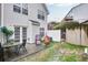 Cozy backyard with patio, outdoor furniture, and partial privacy fencing at 6730 Gallant Se Ct, Mableton, GA 30126