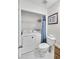 Bathroom with toilet, washer, dryer and granite sink top. Has an organized closet with a shower curtain at 6730 Gallant Se Ct, Mableton, GA 30126