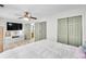 Bedroom with a ceiling fan, hardwood floors, and natural light from the windows at 6730 Gallant Se Ct, Mableton, GA 30126
