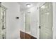 Bright entryway features wood floors, modern light fixtures, and neutral paint at 6730 Gallant Se Ct, Mableton, GA 30126