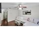 Bright living room with hardwood floors, neutral paint, and comfortable seating arrangement at 6730 Gallant Se Ct, Mableton, GA 30126