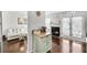 Open layout with a dining space connecting to a comfortable living room and fireplace at 6730 Gallant Se Ct, Mableton, GA 30126