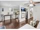 Bright living area with ceiling fan and view of the kitchen and dining space at 6730 Gallant Se Ct, Mableton, GA 30126