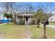 Quaint home with a well-maintained lawn and inviting front porch at 733 Rice Nw St, Atlanta, GA 30318