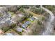 An aerial view showing the property nestled in a quiet neighborhood, surrounded by mature trees and well-maintained homes at 733 Rice Nw St, Atlanta, GA 30318