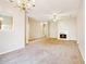 Living room and fireplace, ample natural light and ceiling fan at 1624 River Main Ct, Lawrenceville, GA 30046