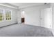 Bedroom with neutral carpet and tray ceiling at 207 Groveton Ct, Euharlee, GA 30145