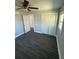 This bedroom features a closet, window, and neutral paint at 2405 Cross Nw St, Atlanta, GA 30318
