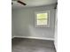 This bedroom offers wood look vinyl flooring, fresh paint and a ceiling fan at 2405 Cross Nw St, Atlanta, GA 30318