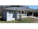 Charming one story home featuring a freshly painted exterior, and covered carport at 2405 Cross Nw St, Atlanta, GA 30318