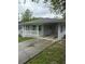 Charming one story home with freshly painted gray brick, new roof and welcoming covered front porch at 2405 Cross Nw St, Atlanta, GA 30318